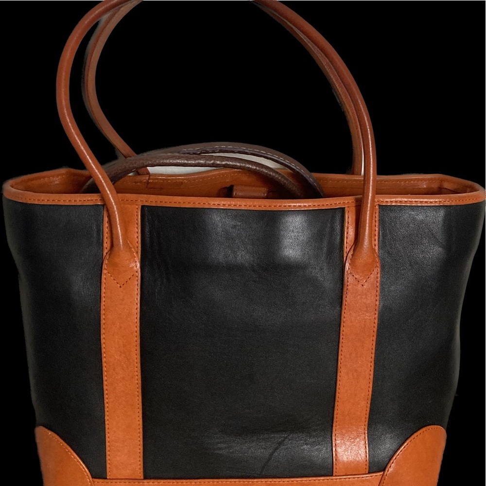 Black leader shoulder bag with orange trim